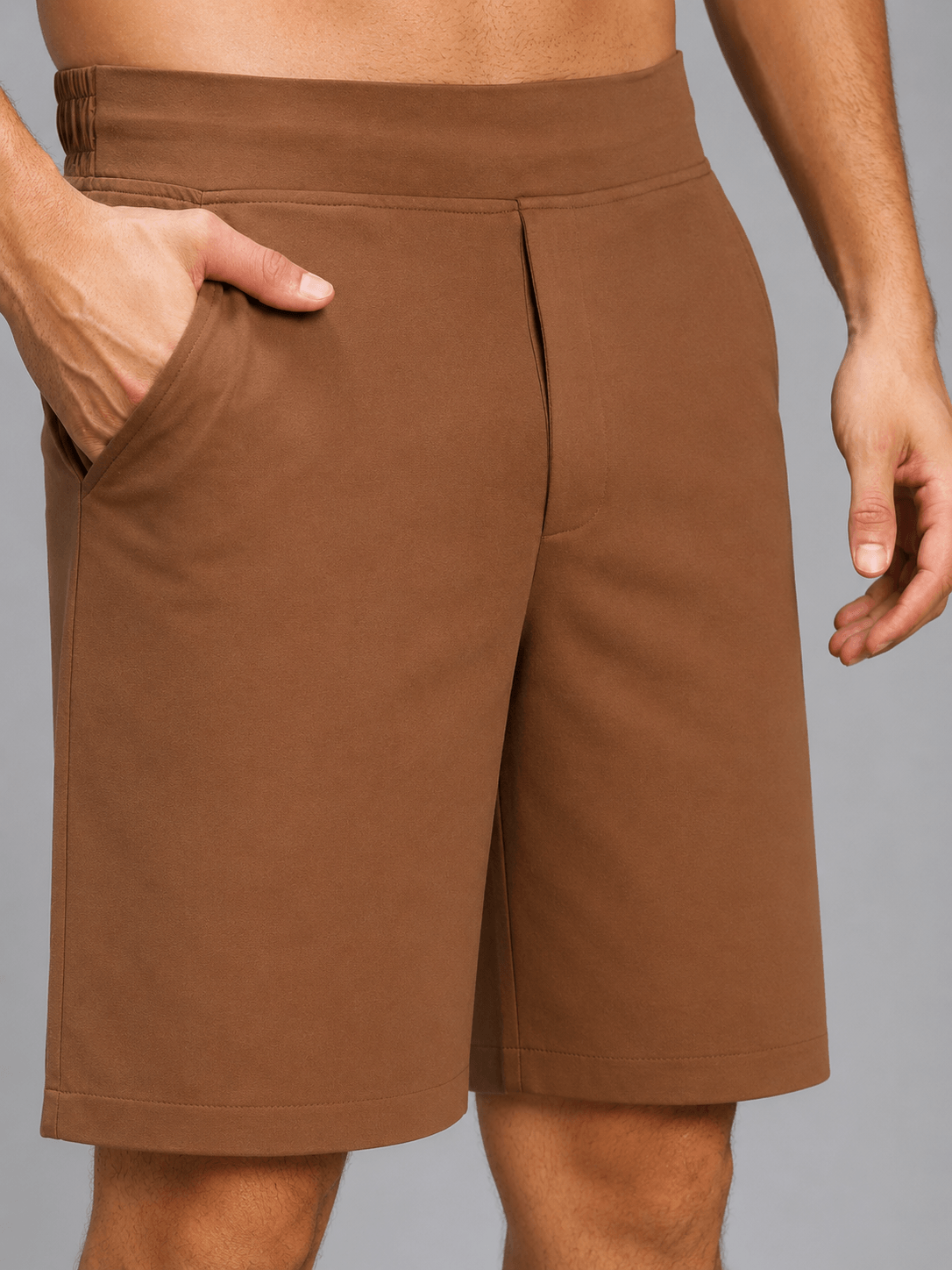 SMART CASUAL TOBACCO REGULAR SHORTS BROWN in polished tobacco brown color with side pockets and a comfortable fit.