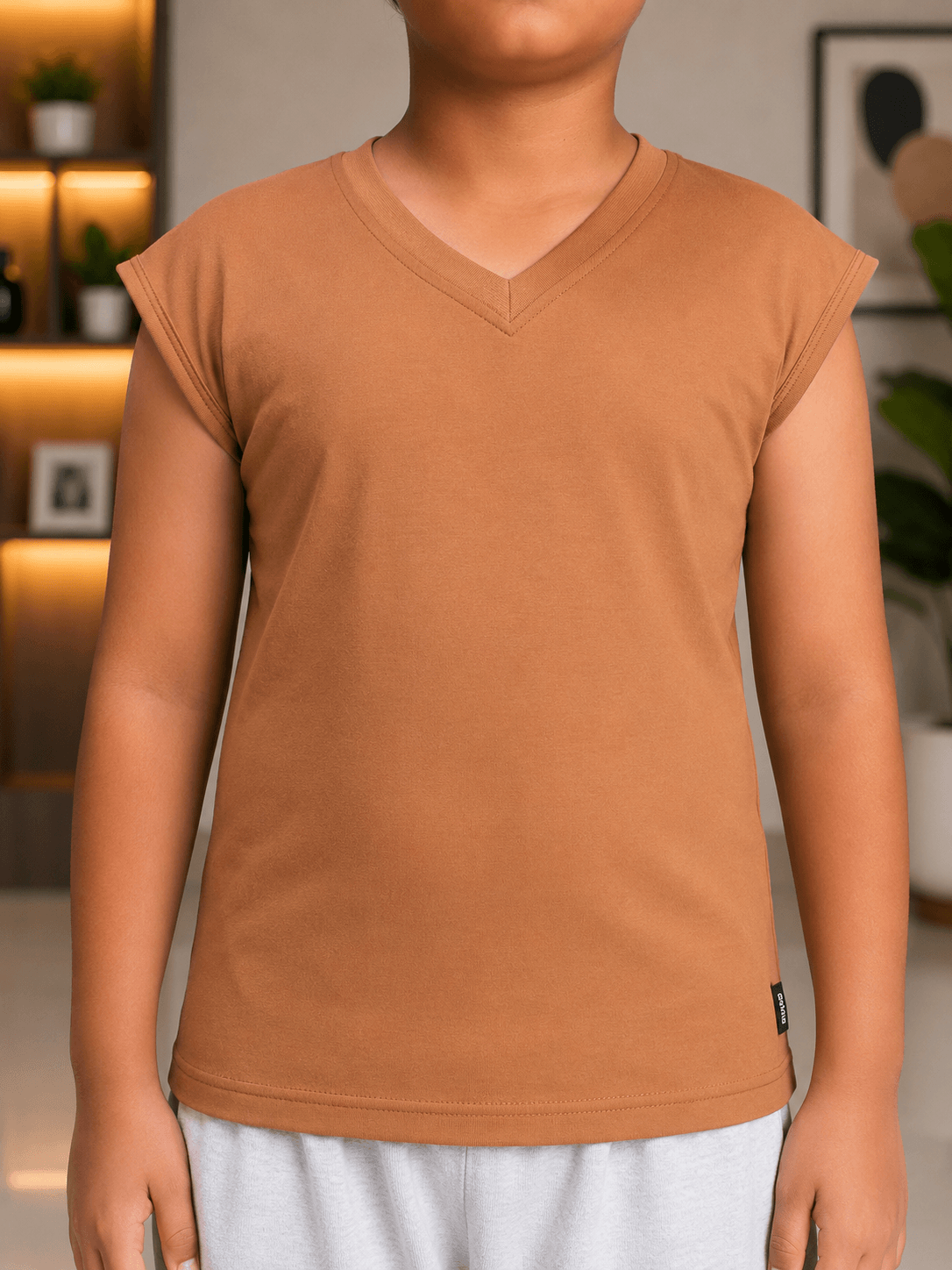 LEVELUP GAMER T-SHIRT FOR BOYS GIRLS BROWN worn by child, showcasing comfortable design and earthy color.