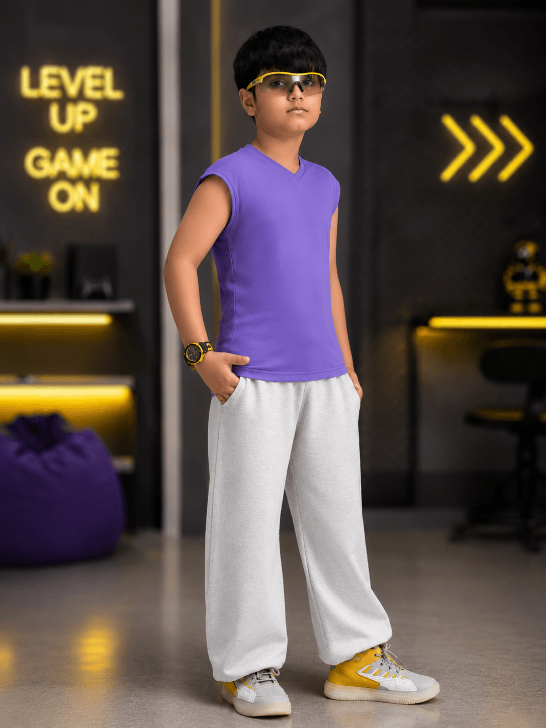 LEVELUP GAMER CO-ORD FOR BOYS GIRLS PURPLE WHITE worn by a boy posing in purple top and white pants indoors.