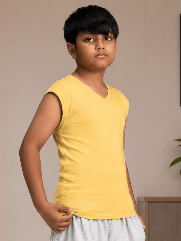 LEVELUP GAMER T-SHIRT FOR BOYS GIRLS YELLOW worn by a child, showcasing vibrant color and casual style.