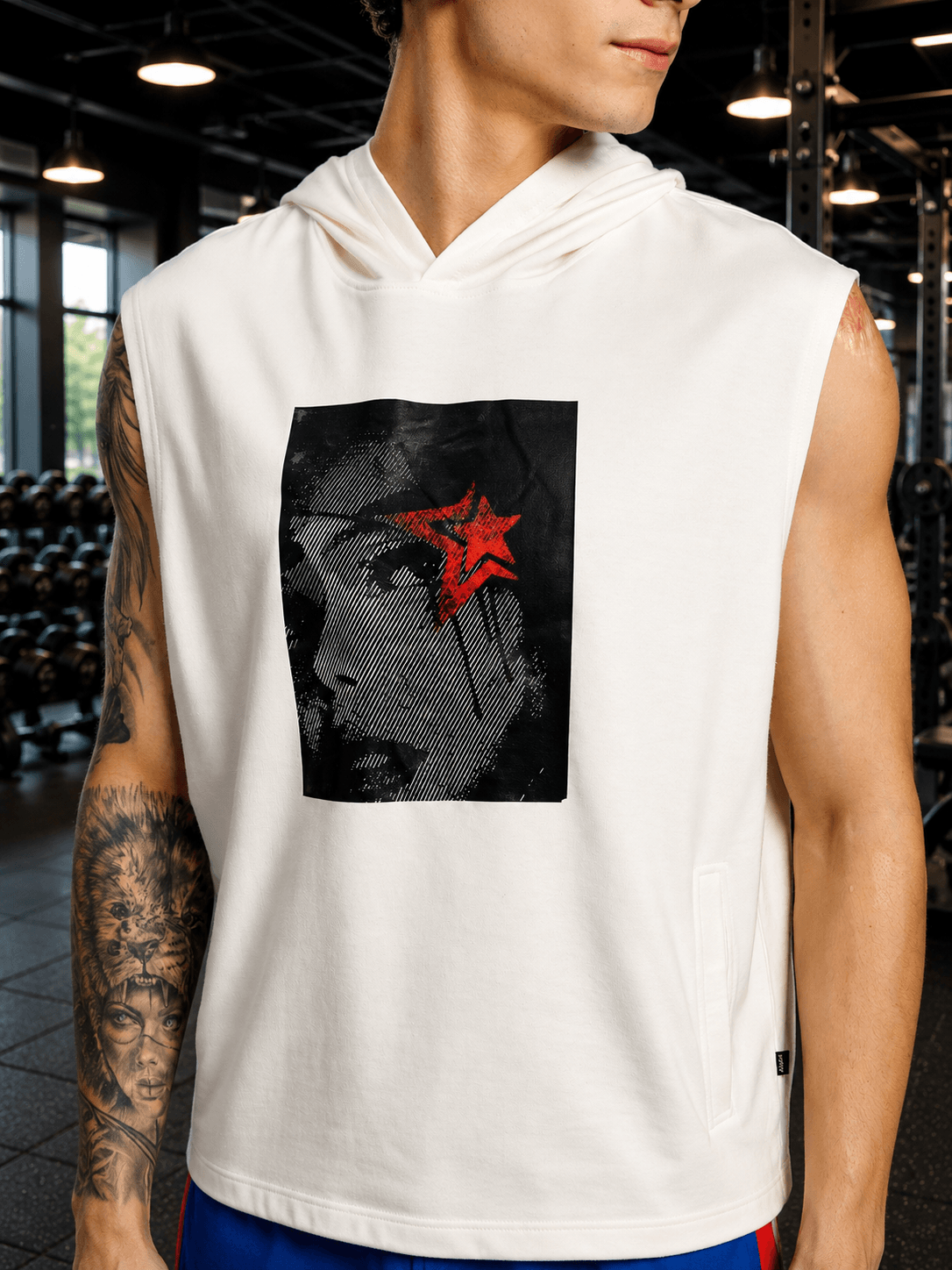 SHADOW FACE SLEEVELESS T-SHIRT WHITE worn by a male model in a gym setting with bold graphic design.