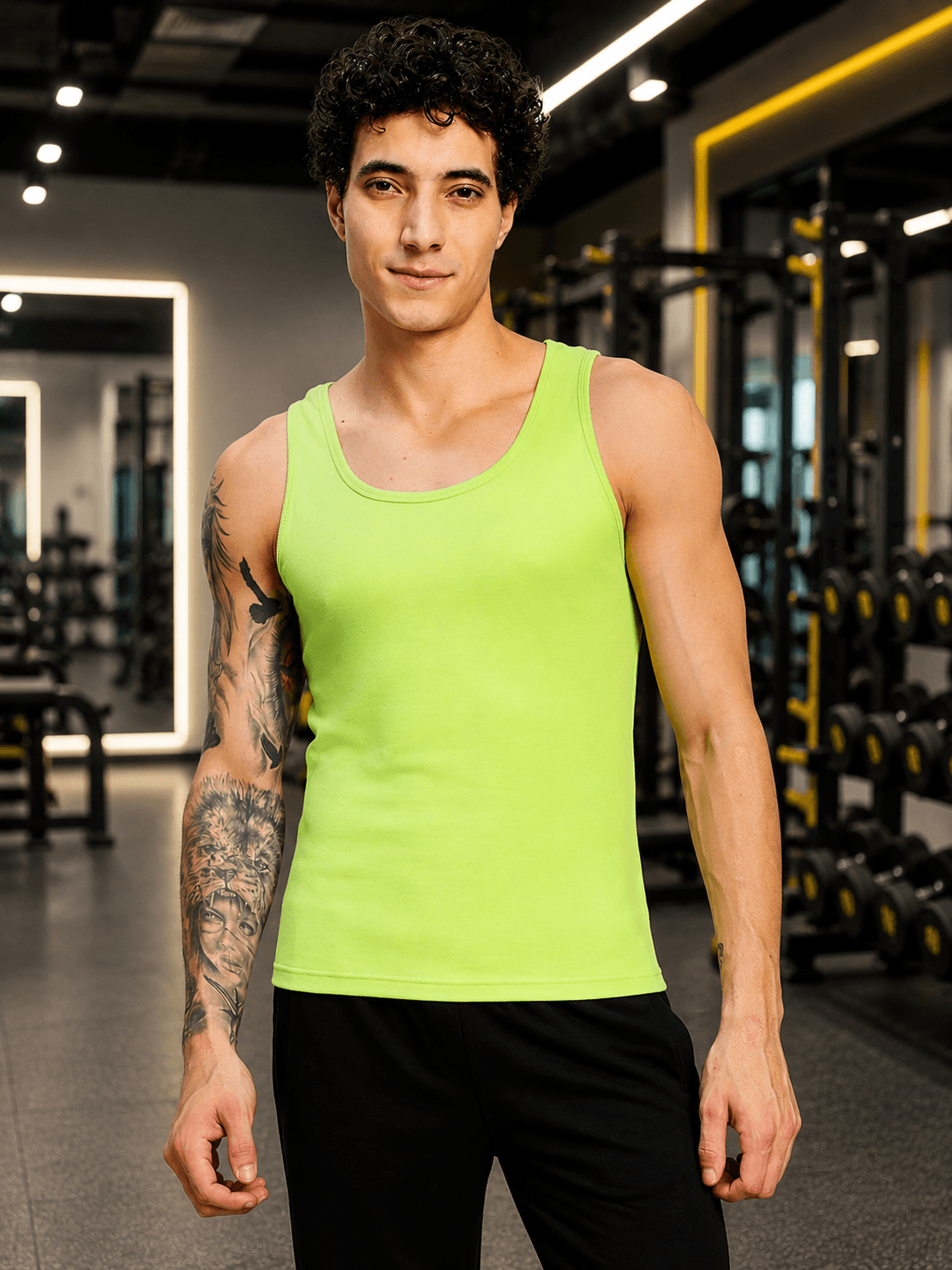 EASY WEAR VEST GYM T-SHIRT NEON GREEN worn by a man in a gym setting.
