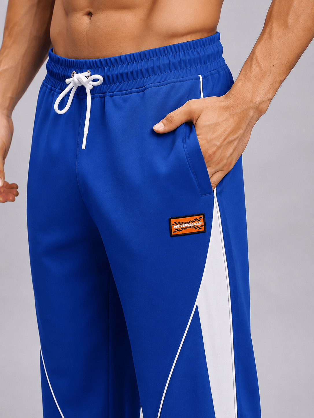 BOLD ELECTRIC RELAXED-FIT JOGGERS BLUE featuring a relaxed fit and vivid blue tone for standout streetwear style.