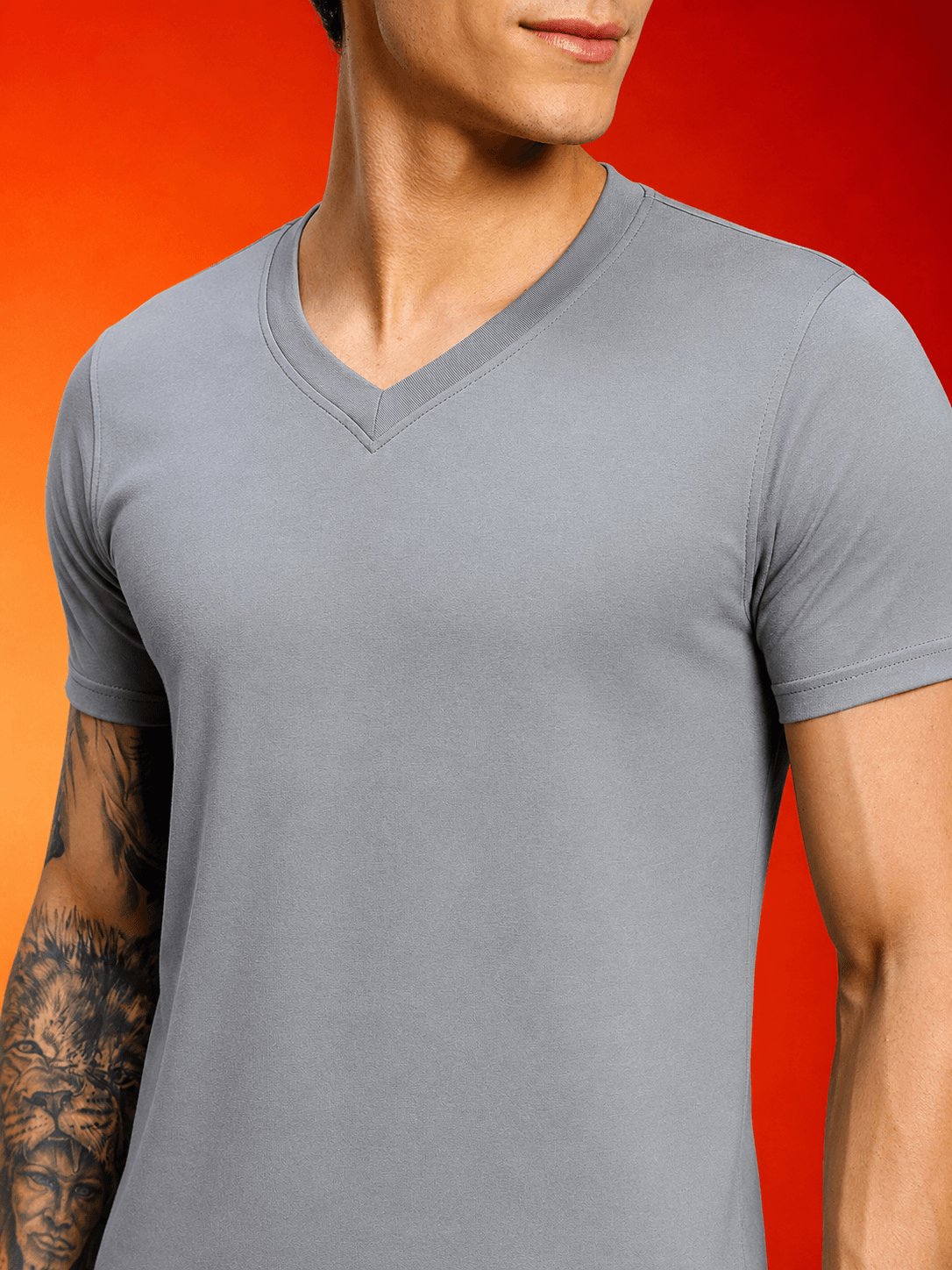 CORE SHORT REGULAR FIT T-SHIRT GREY displayed on a model, featuring a v-neck and a clean grey tone.