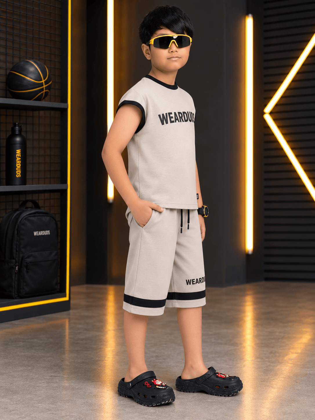 MONO EDGE SLEEVELESS CO-ORD FOR BOYS GIRLS BEIGE worn by a boy in a stylish indoor setup.