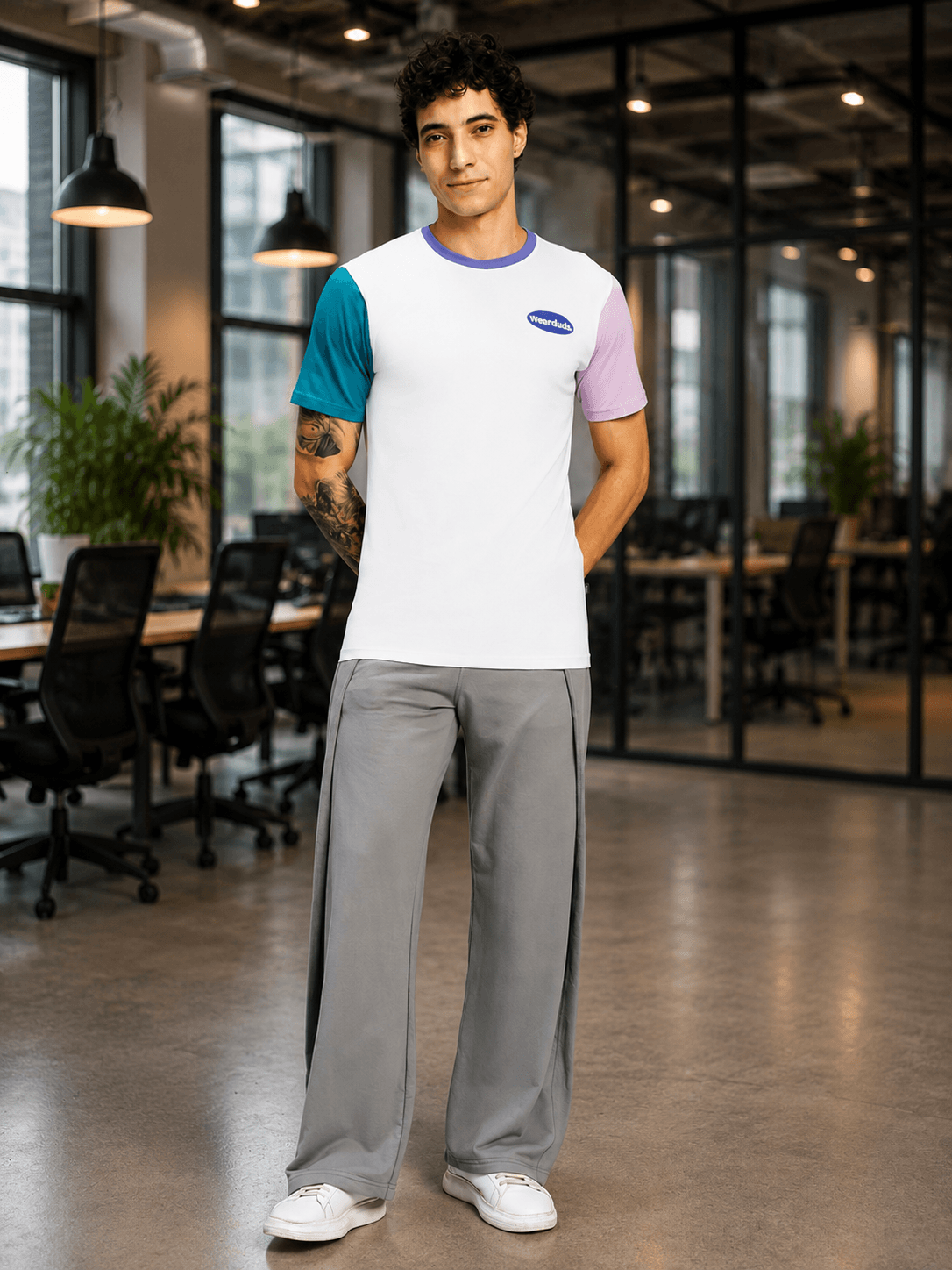 CHILL REGULAR FIT T-SHIRT WHITE MULTI worn by a model in a modern office setting.