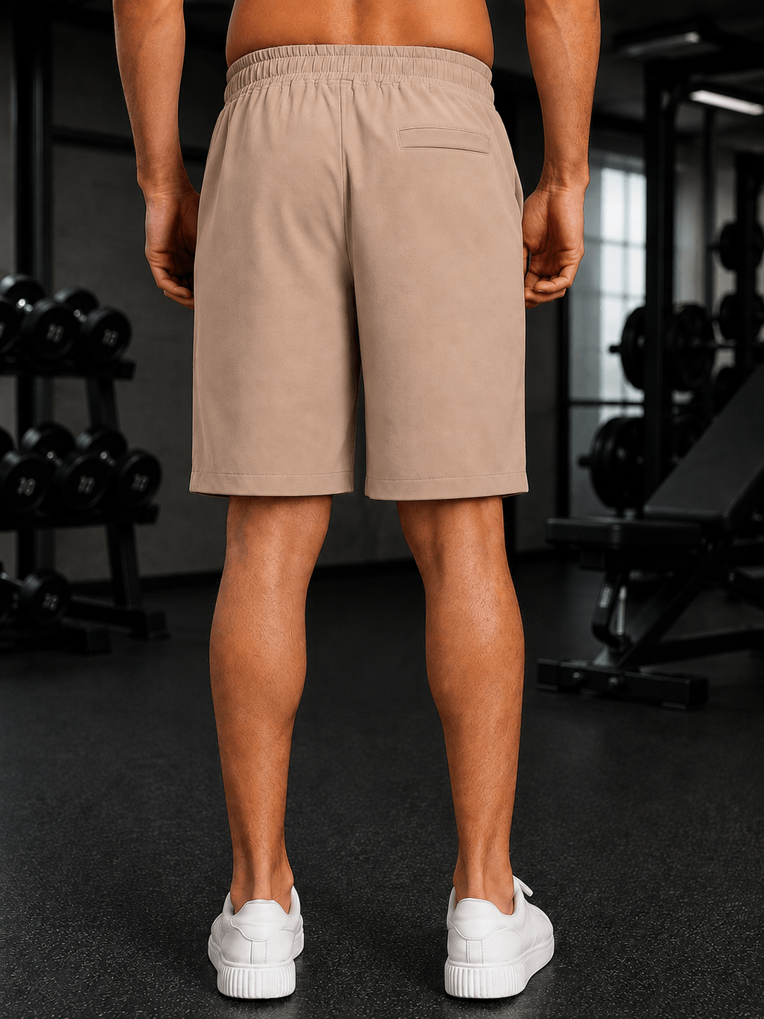 Model wearing SMART CASUAL TOBACCO REGULAR SHORTS BEIGE from the back, showcasing a comfortable fit.