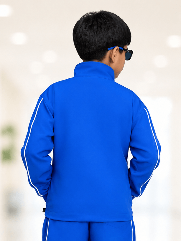 RELIGHT RELAXED FIT JACKET FOR BOYS GIRLS ROYAL BLUE worn by a child from the back, showcasing vibrant royal blue color.