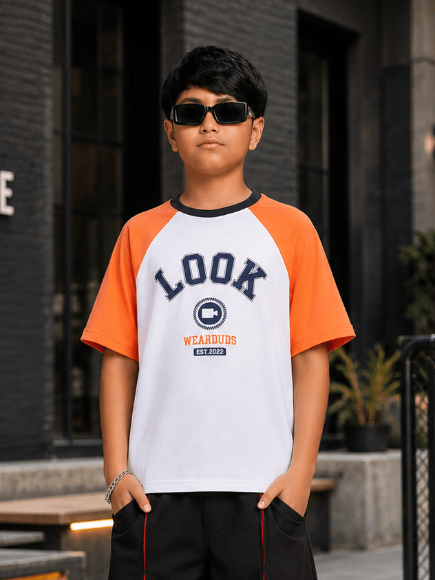STREET CLUB T-SHIRT BOYS GIRLS WHITE ORANGE worn by a boy with sunglasses in an urban setting.