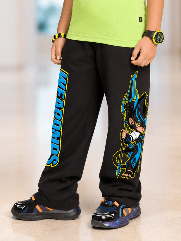 ELECTRIC WARRIOR JOGGER FOR BOYS GIRLS BLACK worn by a child, featuring a colorful design and comfortable fit.