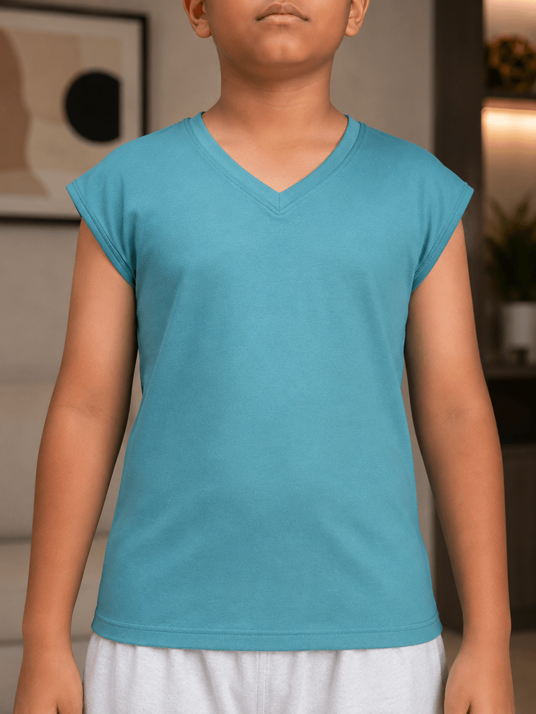 LEVELUP GAMER T-SHIRT FOR BOYS GIRLS SKY BLUE worn by a child, showcasing its vibrant design and comfy fit.
