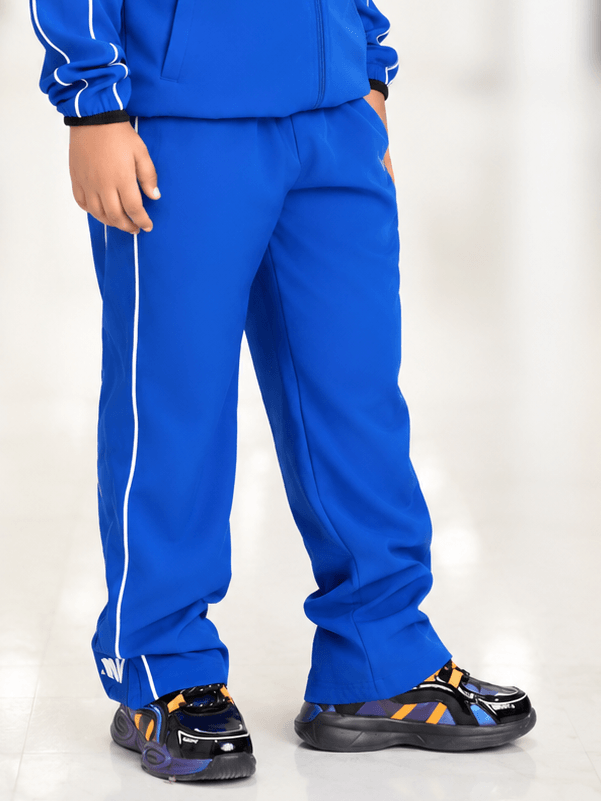 RELIGHT RELAXED FIT JOGGER FOR BOYS GIRLS ROYAL BLUE worn by a child, showcasing style and comfort in vibrant royal blue.