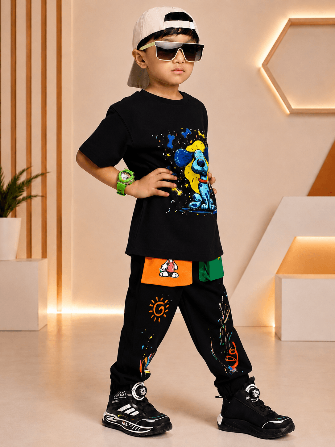 CUTE BLUE PUPPY PRINT CO-ORD FOR BOYS GIRLS BLACK showcased on a stylish boy wearing sunglasses and a cap.