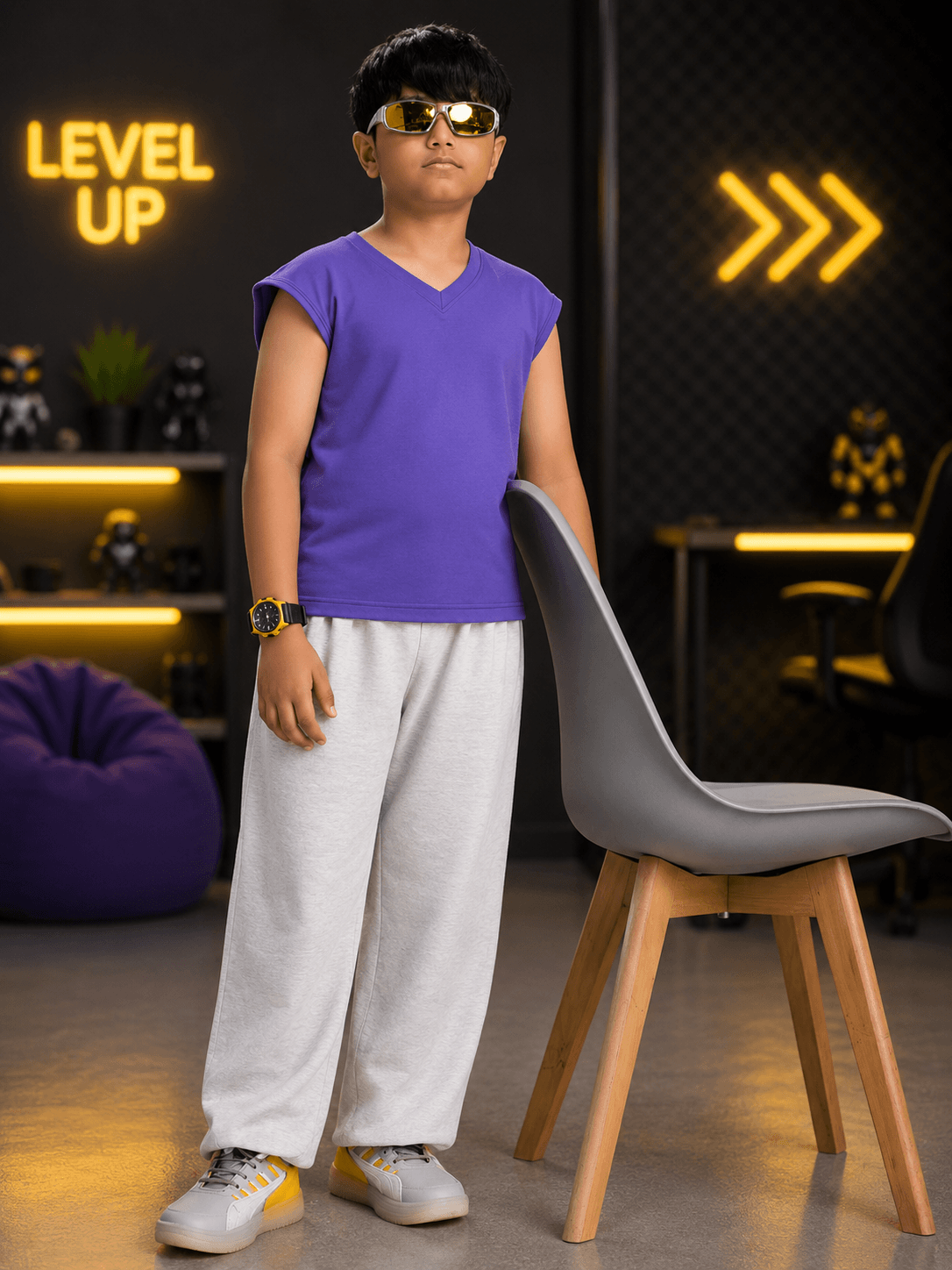 CoolFit Jogger for Boys Girls White worn by a child in a stylish setting, showcasing sporty comfort and style.