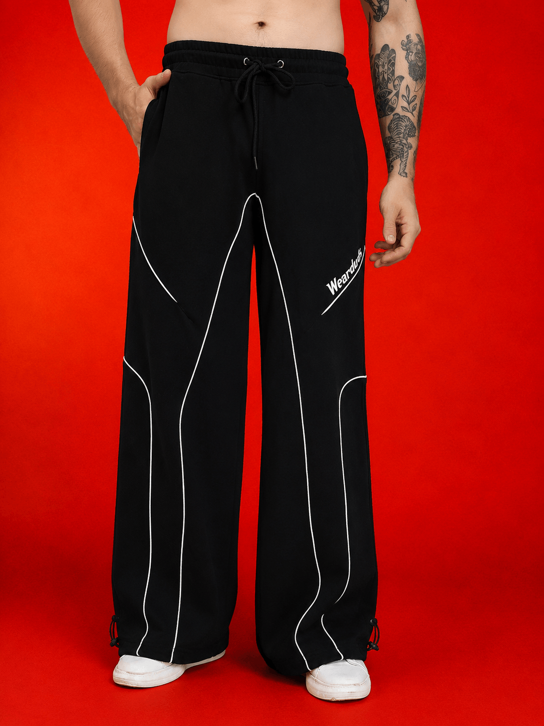 SIGNATURE PIPING JOGGERS BLACK featuring contrast piping detail and a relaxed fit for comfort and style.