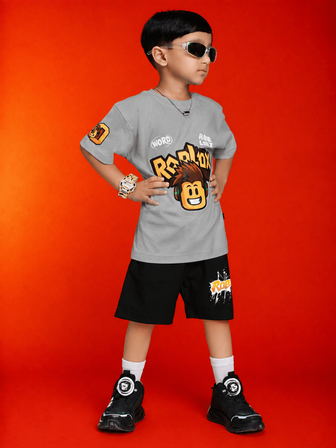 ROBLOX WORLD FIT CO-SET FOR BOYS GIRLS GREY BLACK showcased on a child wearing sunglasses and stylish outfit.