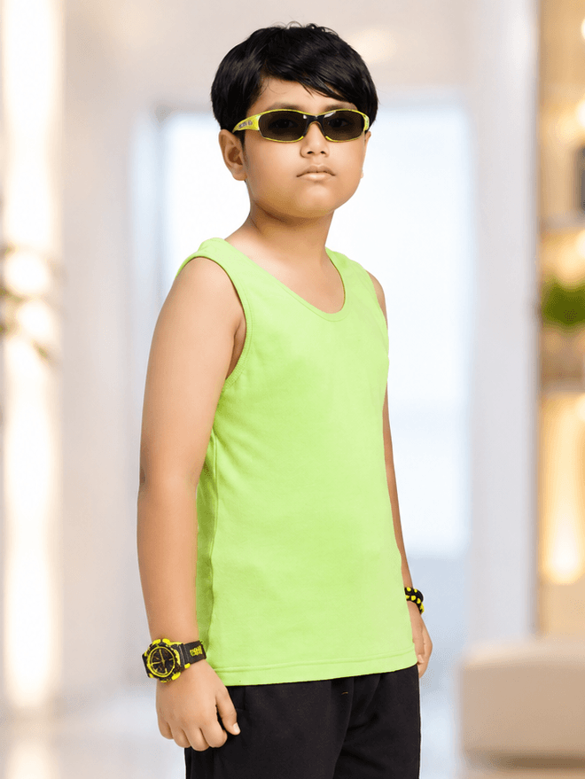 EASY WEAR VEST T-SHIRT FOR BOYS GIRLS NEON GREEN worn by a boy in sunglasses, showcasing a vibrant neon green color.