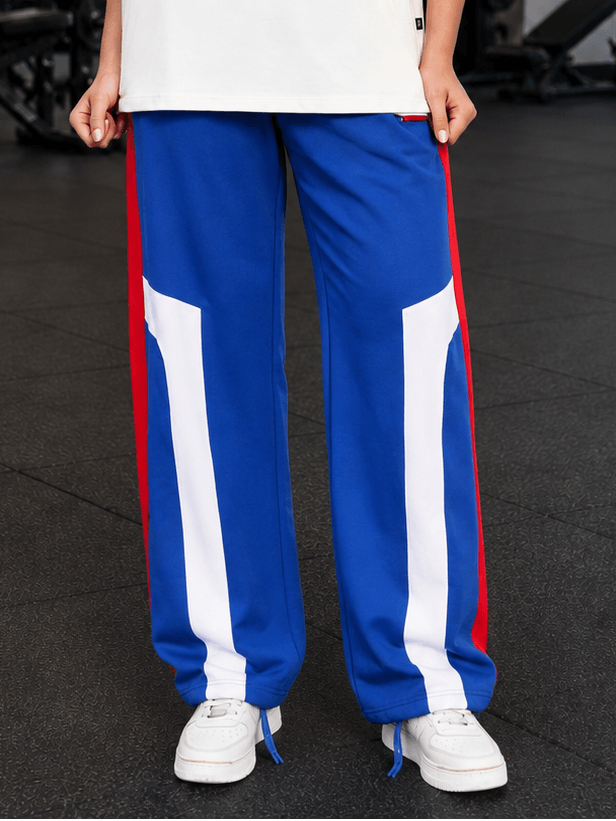 WOMEN RETRO RUNNER RELAXED-FIT JOGGERS BLUE MULTI featuring blue and white multi-tone design, perfect for sporty streetwear.