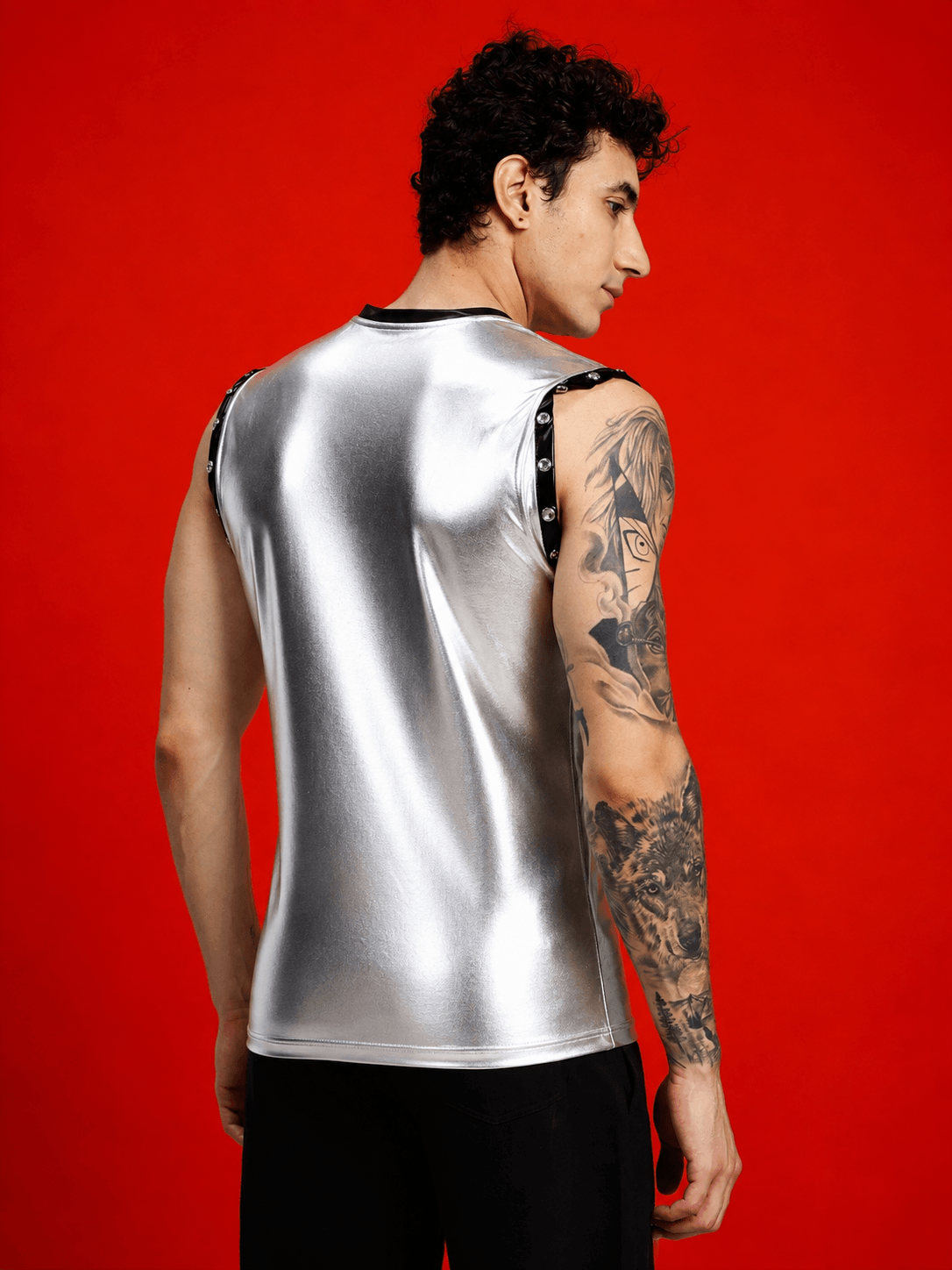 Back view of a model wearing the SHINY FOIL TANK SLEEVELESS GYM T-SHIRT SILVER with a modern metallic finish.