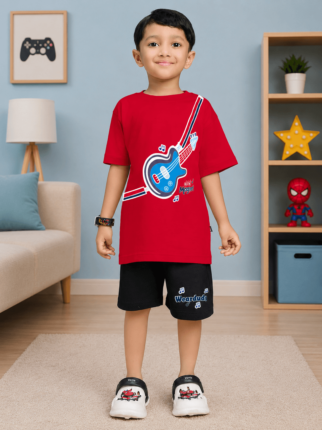LITTLE ROCKSTAR CO-ORD FOR BOYS & GIRLS RED BLACK featuring a boy in a red t-shirt and black shorts with a guitar design.