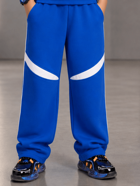 KIDS ROSTER JOGGER FOR BOYS GIRLS BLUE featuring a stylish blue design with white accents.