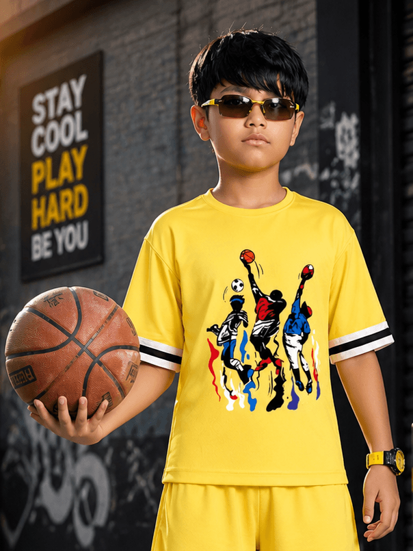 THE STREET T-SHIRT FOR BOYS GIRLS YELLOW worn by a boy holding a basketball, exuding style and comfort.