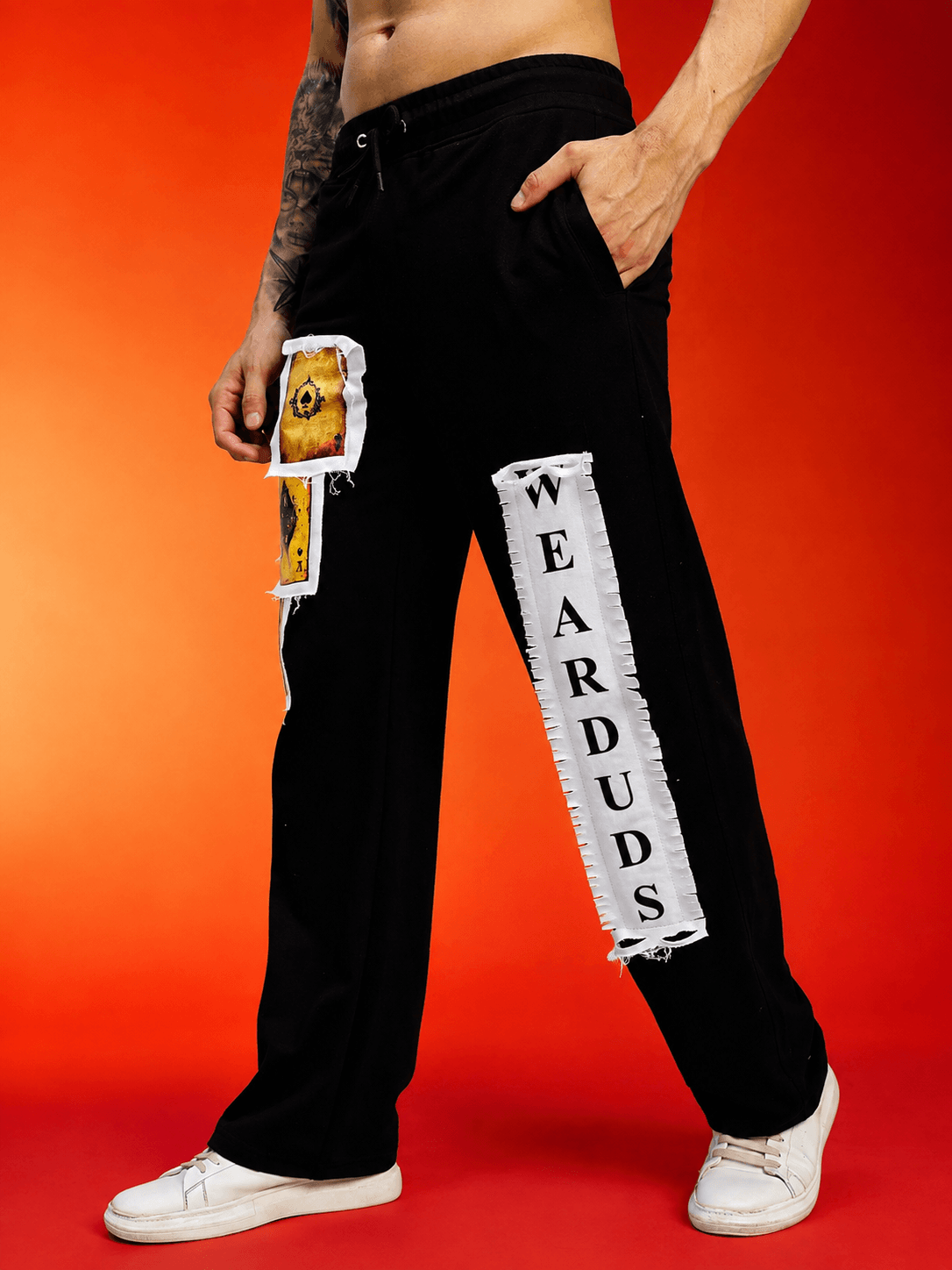 WILDCARD RAW-CANVAS GRAPHIC JOGGERS BLACK featuring edgy graphic design and a modern silhouette.