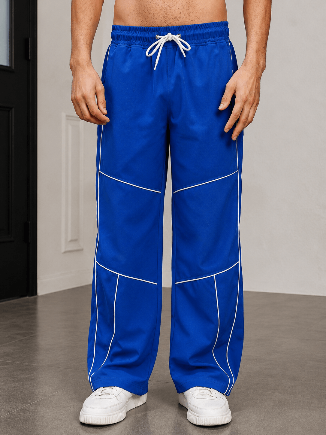RAIDER RELAXED PANT JOGGER BLUE displayed on a model showcasing the relaxed fit and vibrant color.