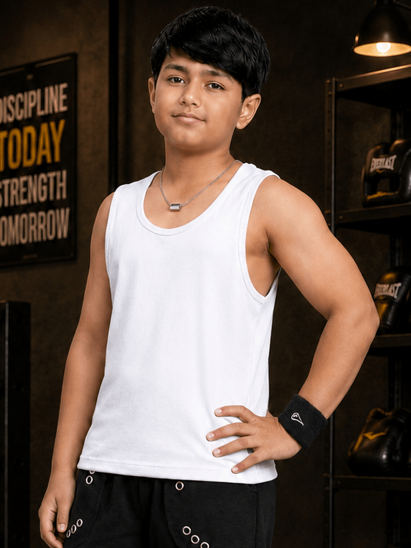 EASY WEAR VEST T-SHIRT FOR BOYS GIRLS WHITE modeled by a boy in a casual setting, showcasing sporty style and comfort.