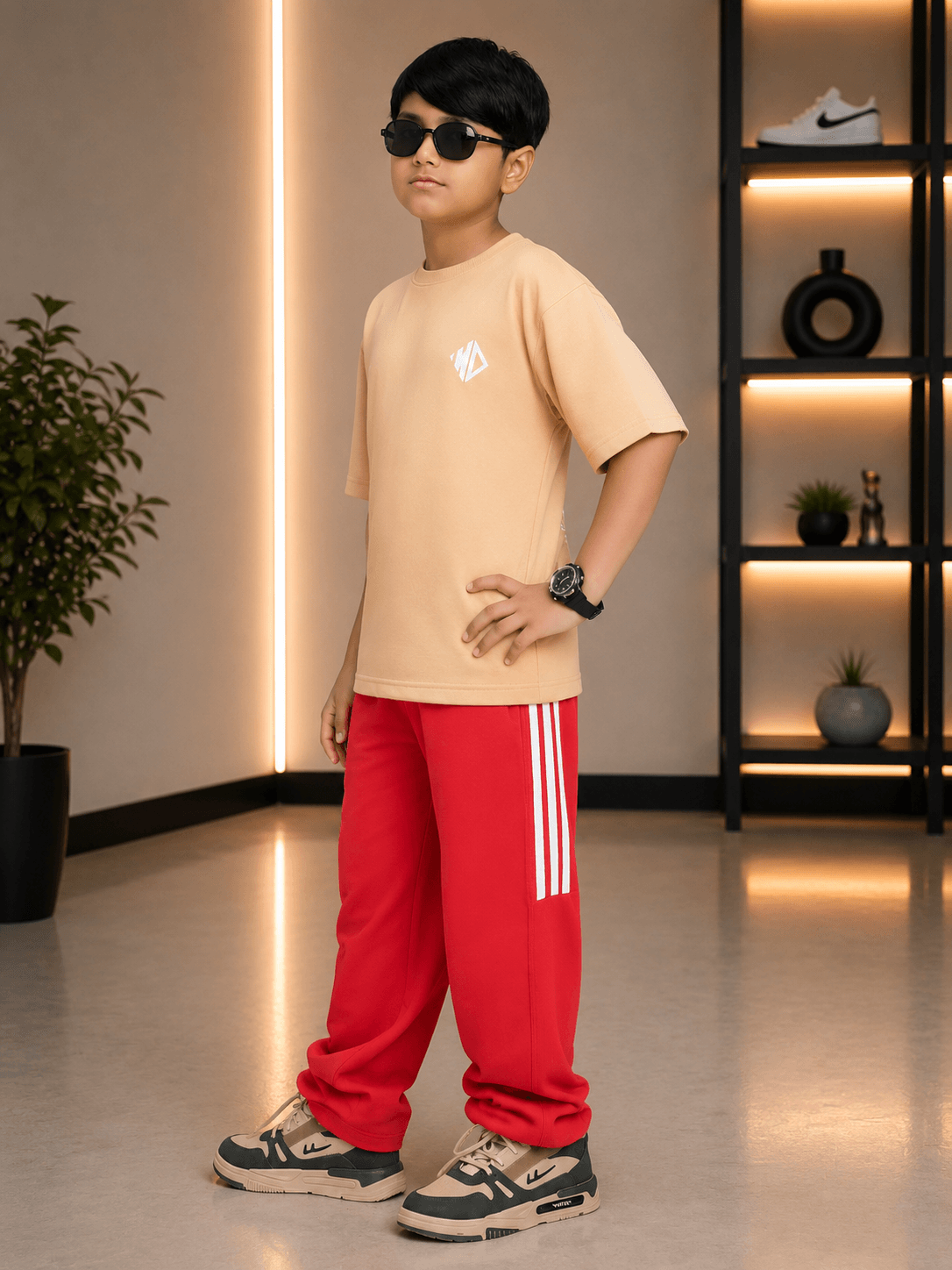 NEO STREET DROP CO-ORD FOR BOYS GIRLS BEIGE RED displayed on a stylish boy in a modern indoor setting.