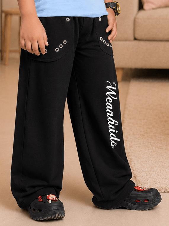 SIGNATURE SCRIPT JOGGER FOR BOYS GIRLS BLACK displayed on a child, showcasing a stylish streetwear look.