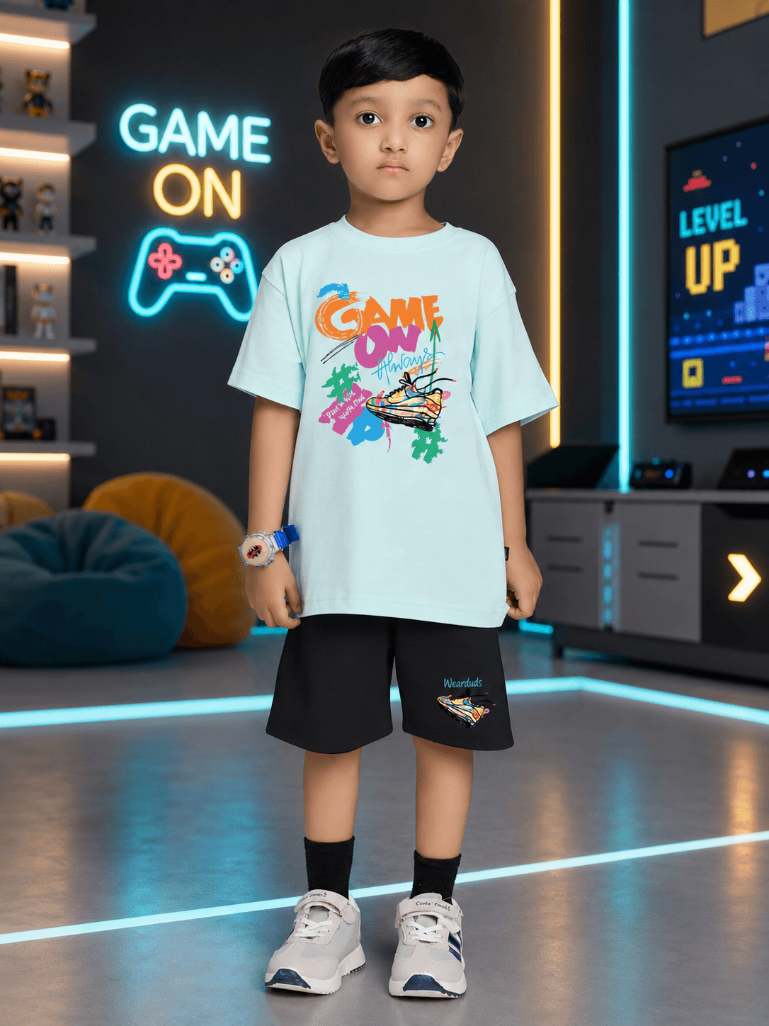 ICE MINT GAME CO-ORD SET FOR BOYS GIRLS SKY BLUE BLACK worn by a boy standing in a game-inspired room.
