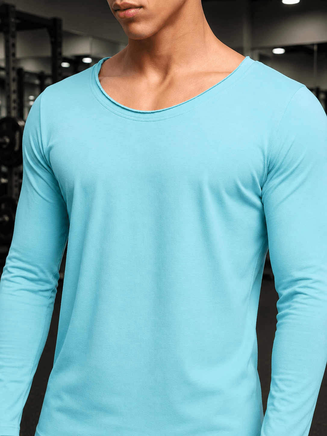 JOEL SLIM FIT COTTON SWEATSHIRT SKY BLUE, showcasing a modern, comfortable design in a gym setting.