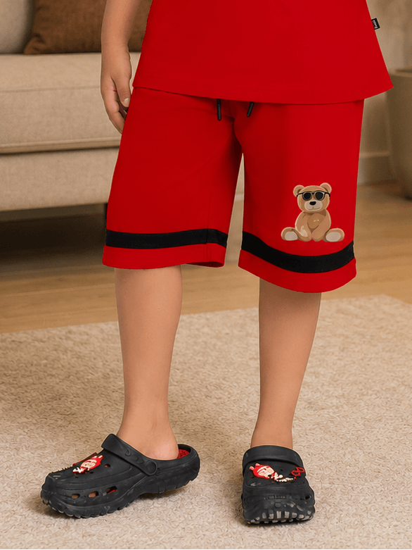 COOL TEDDY BEAR SHORTS FOR BOYS GIRLS RED worn by a child, showcasing playful teddy bear design and vibrant red color.