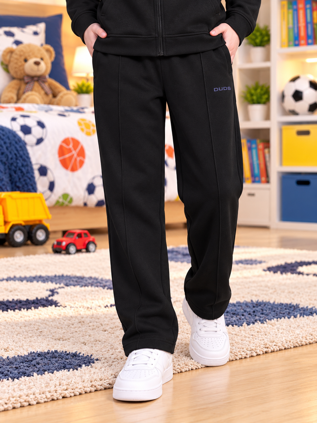 SHAGGY FLEECE CO-ORD FOR BOYS GIRLS BLACK matching set shown on child in cozy bedroom setting