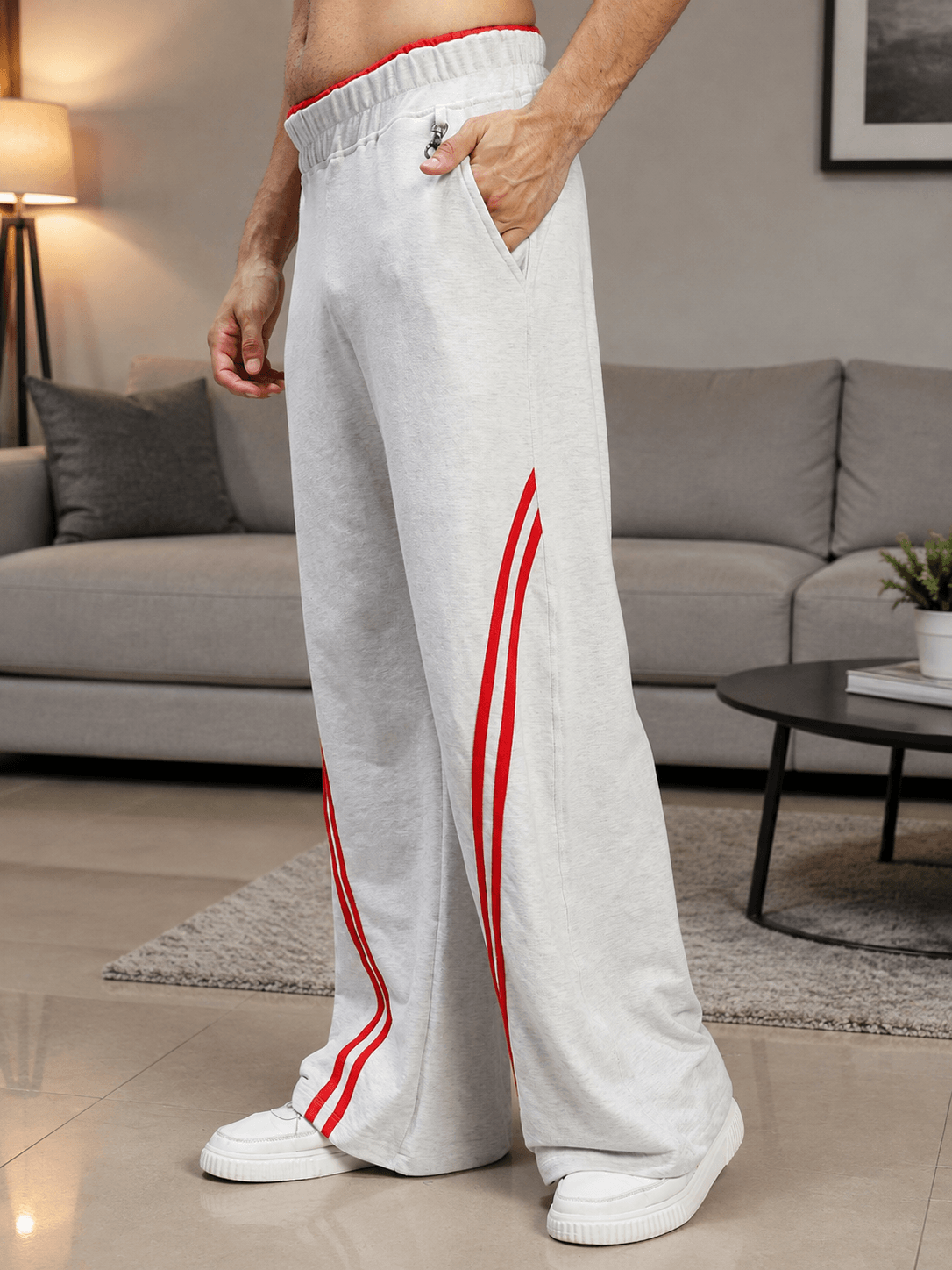 SNOW STREETWEAR BAGGY JOGGERS MELANGE GREY featuring a relaxed fit and stylish red stripes.