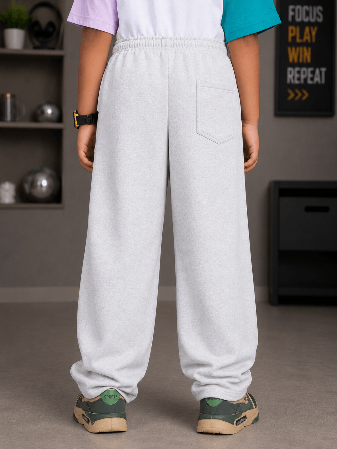 CHILL JOGGER FOR BOYS GIRLS WHITE back view of stylish gray joggers for kids, showcasing comfort and relaxed fit.