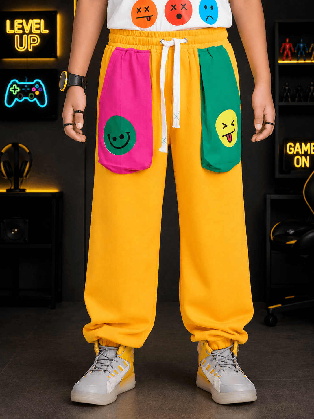 EMOJI VIBES JOGGER FOR BOYS GIRLS YELLOW with colorful emoji pockets and a vibrant yellow shade.