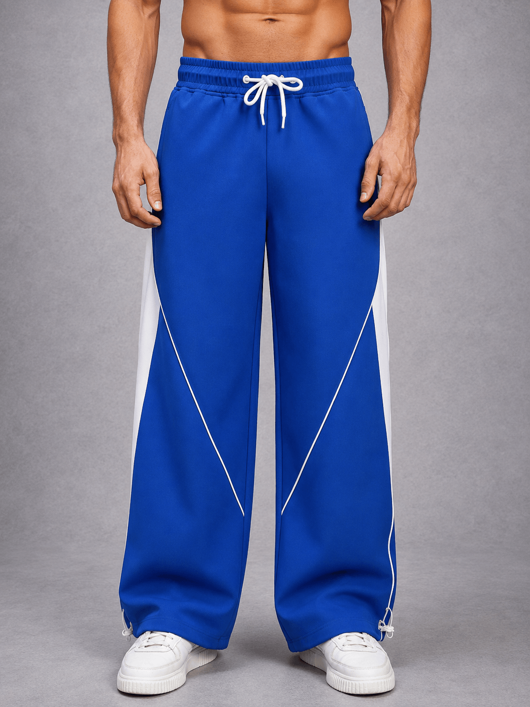 BOLD ELECTRIC RELAXED-FIT JOGGERS BLUE featuring a vivid blue color and relaxed silhouette for casual styling.