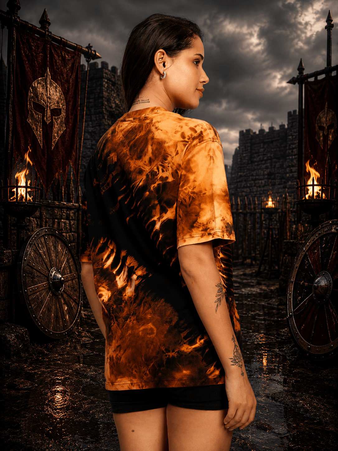 Women Solar Tie-Dye T-Shirt Black Fire Orange worn by a model in a bold urban setting.
