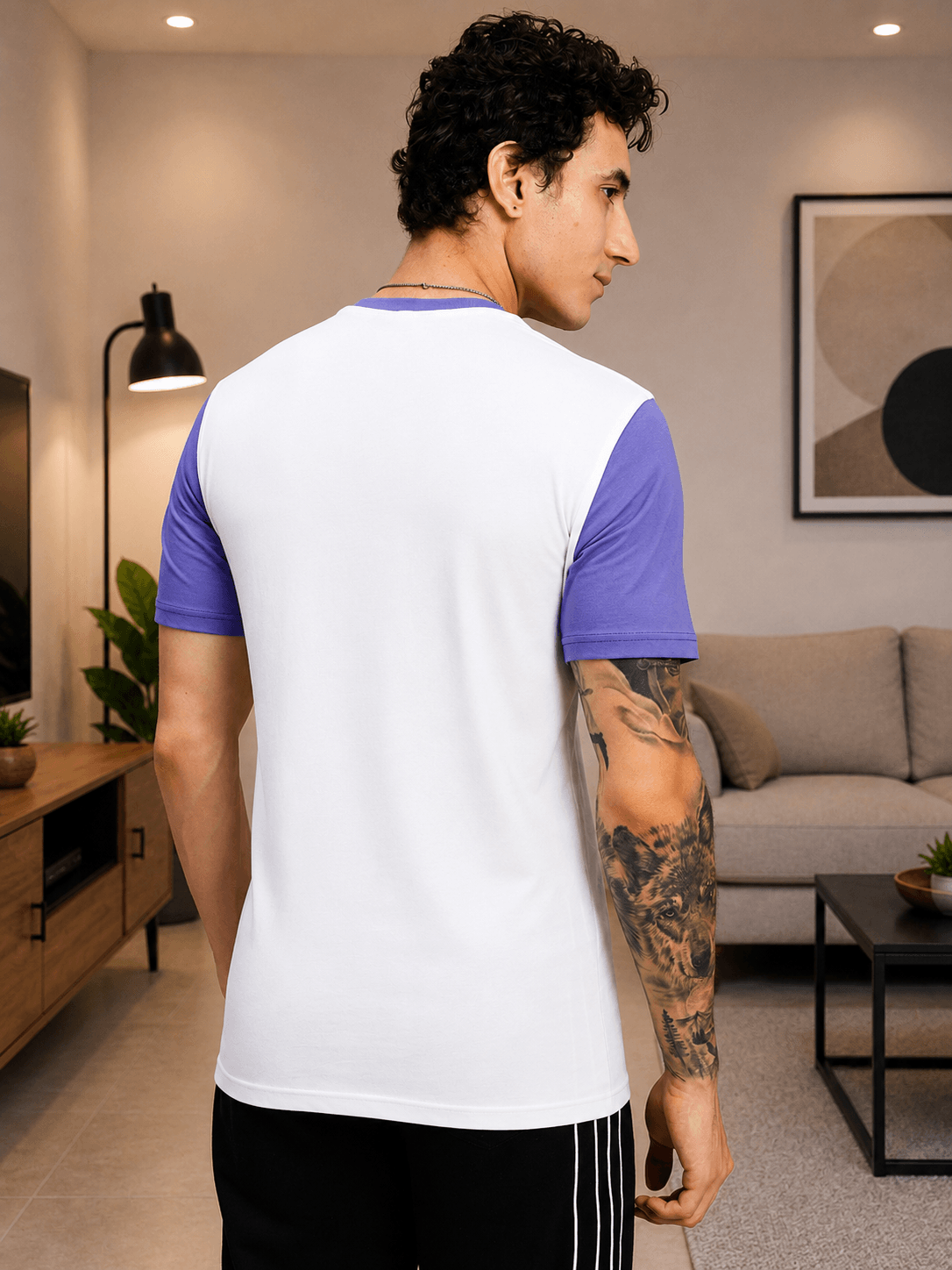 Man wearing STREET WONDER REGULAR FIT T-SHIRT WHITE MULTI from the back, showcasing its unique design.