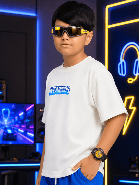 FUSION T-SHIRT FOR BOYS GIRLS WHITE, worn by a boy in cool sunglasses, against a vibrant gaming background.