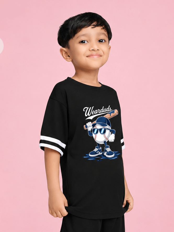 MASCOT GRAPHIC T-SHIRT FOR BOYS GIRLS BLACK WHITE worn by a boy with a playful graphic design