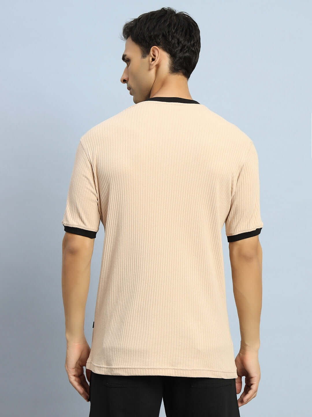 Model wearing Filipino Zipper Regular Fit T-Shirt in beige with half sleeves, 100% cotton, premium fabric, ideal for all-day comfort.