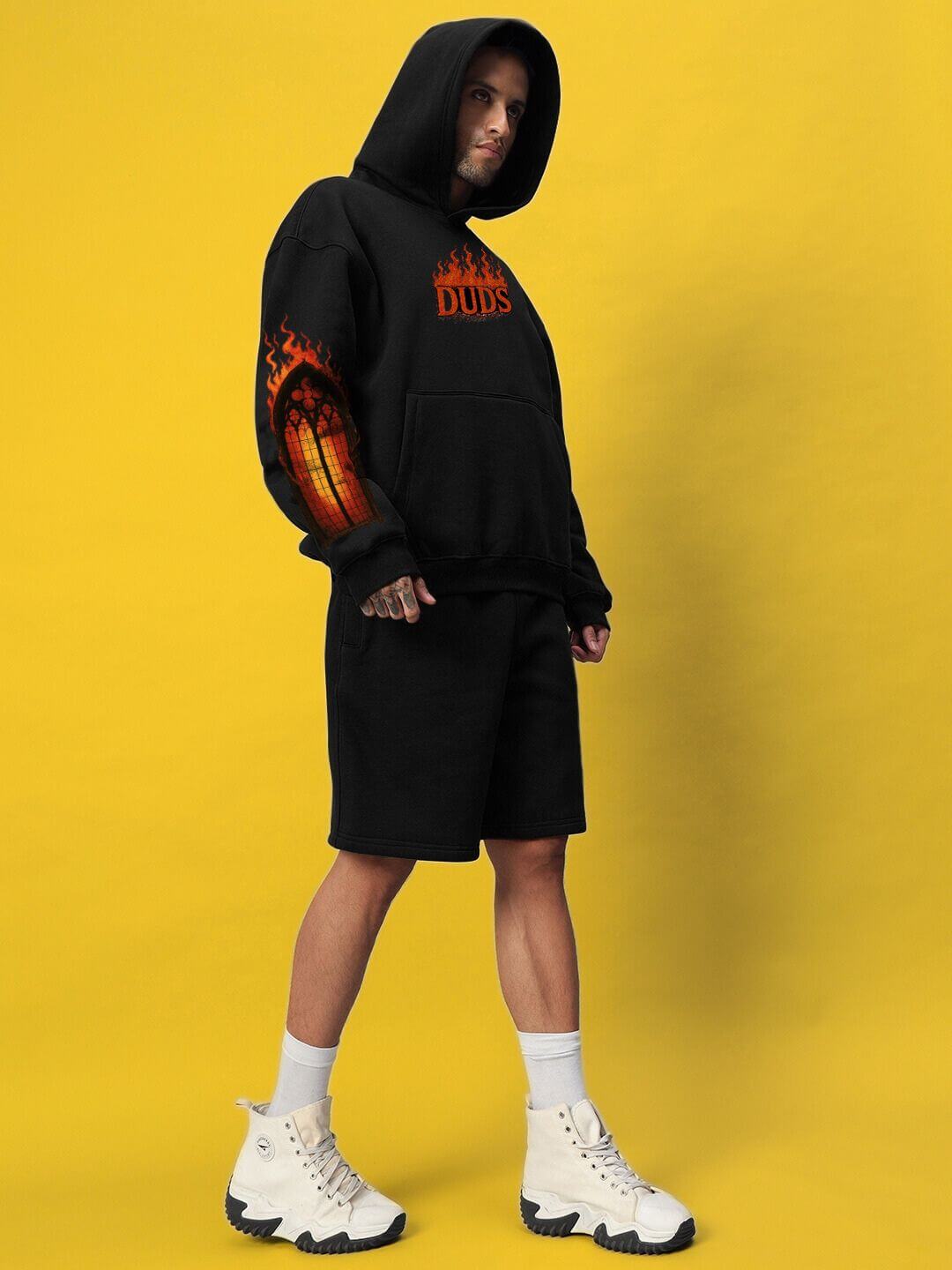 FIRE NEVER KILLS THE LIGHT FLEECE CO-ORD BLACK on model, showcasing bold and stylish statement with soft fleece and sleek silhouette.
