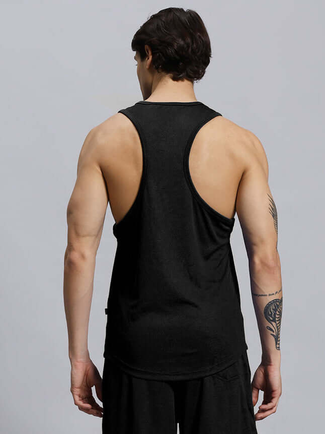 Back view of FLEX GYM T-SHIRT SLEEVELESS BLACK showcasing athletic design, perfect for workouts, with customizable size option available.