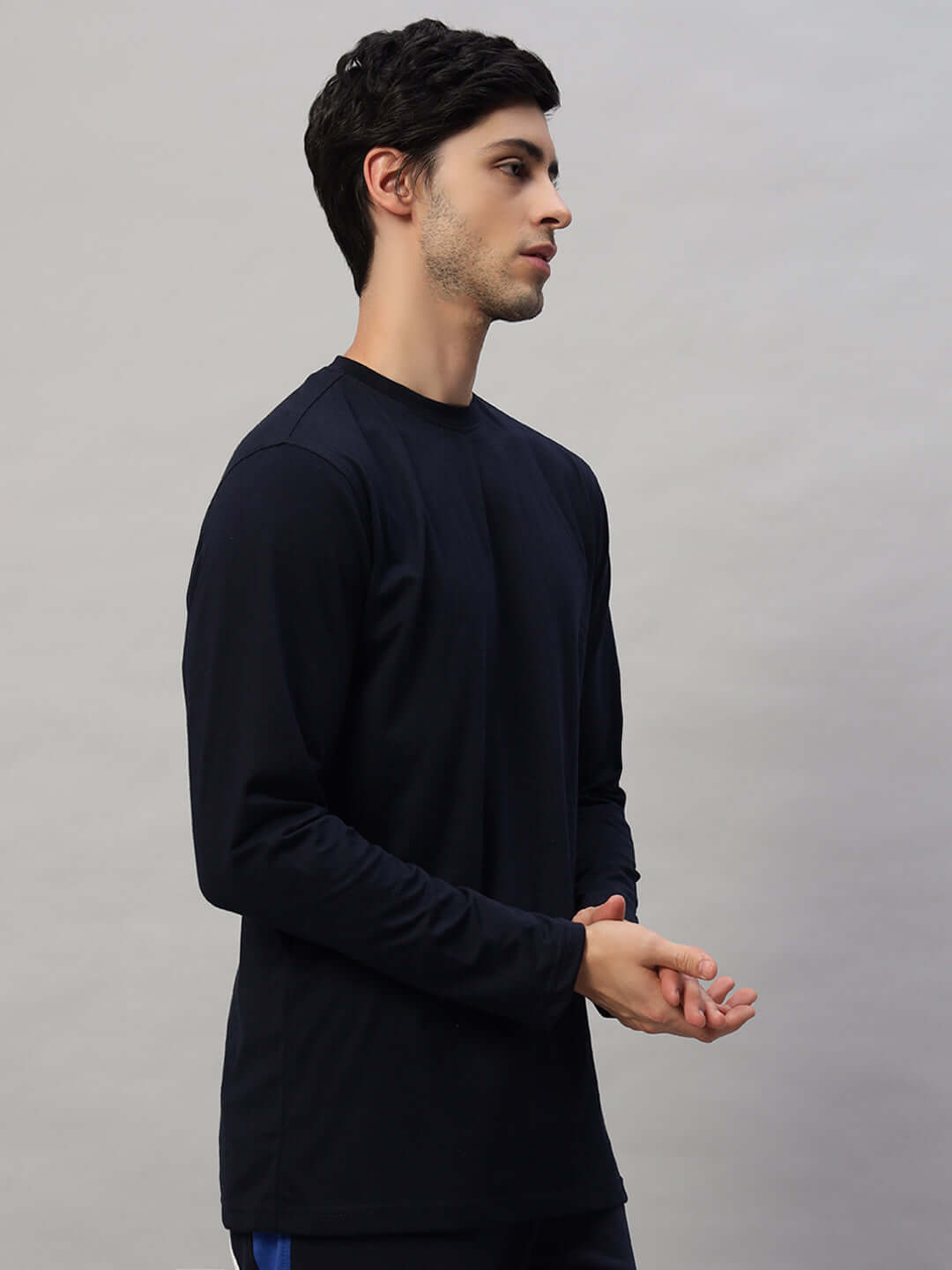 Navy blue slim fit sweatshirt made from 100% cotton, featuring a model showcasing the comfortable design.