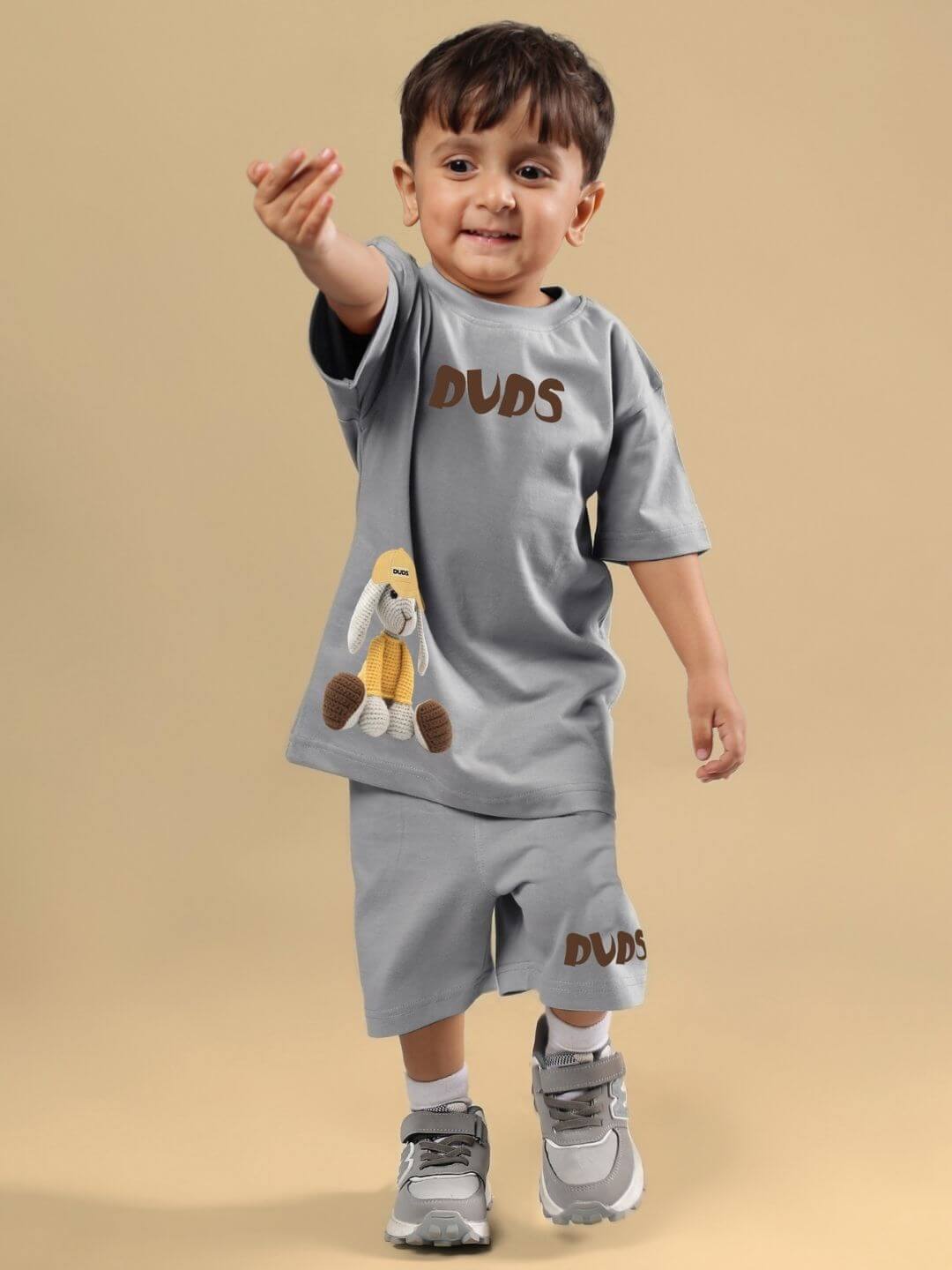 Child wearing FLINT BUNNY CO-ORD FOR BOYS AND GIRLS GREY set, featuring a cute bunny design, perfect for stylish and comfortable kids' wear.