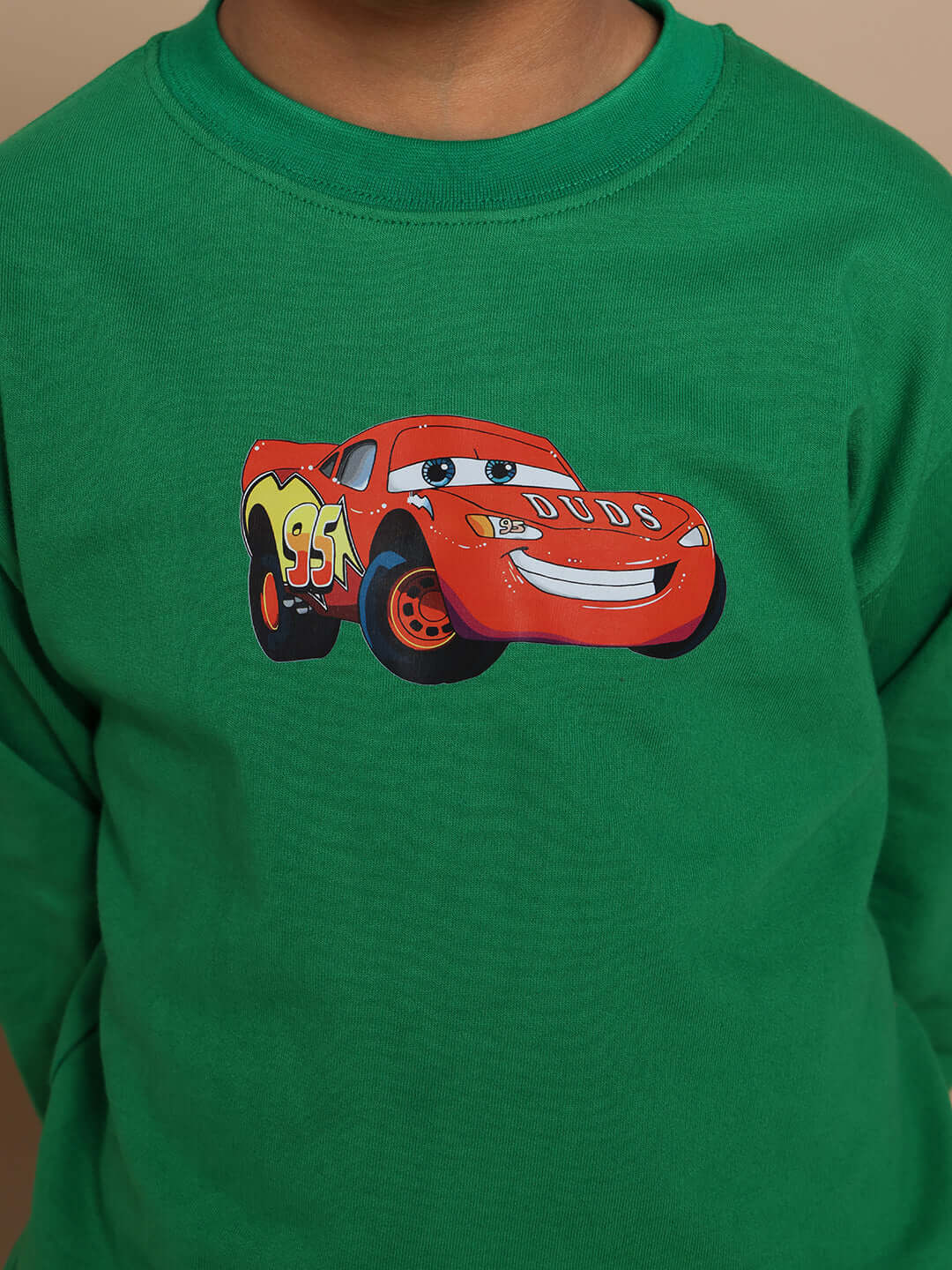 Green Formula 1 oversized sweatshirt for boys and girls with car graphic, made to order by DUDS, displayed on a child model