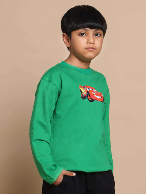 Child wearing green and black Formula 1 co-ord with cartoon car graphic, designed for boys and girls, tailored by DUDS.